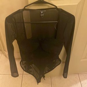 Black Lacey body suit never worn
